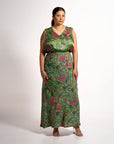 Front view of model wearing the green floral Jenni maxi skirt and matching sleeveless V-neck top set.
