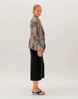 The Pilbara Wildflowers artwork by Sheryl Hicks printed on the Kirrikin jacket.