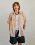 Detailed view of Sheryl Hicks' Indigenous Dry Country design printed on Kirrikin men's lightweight short sleeve shirt.