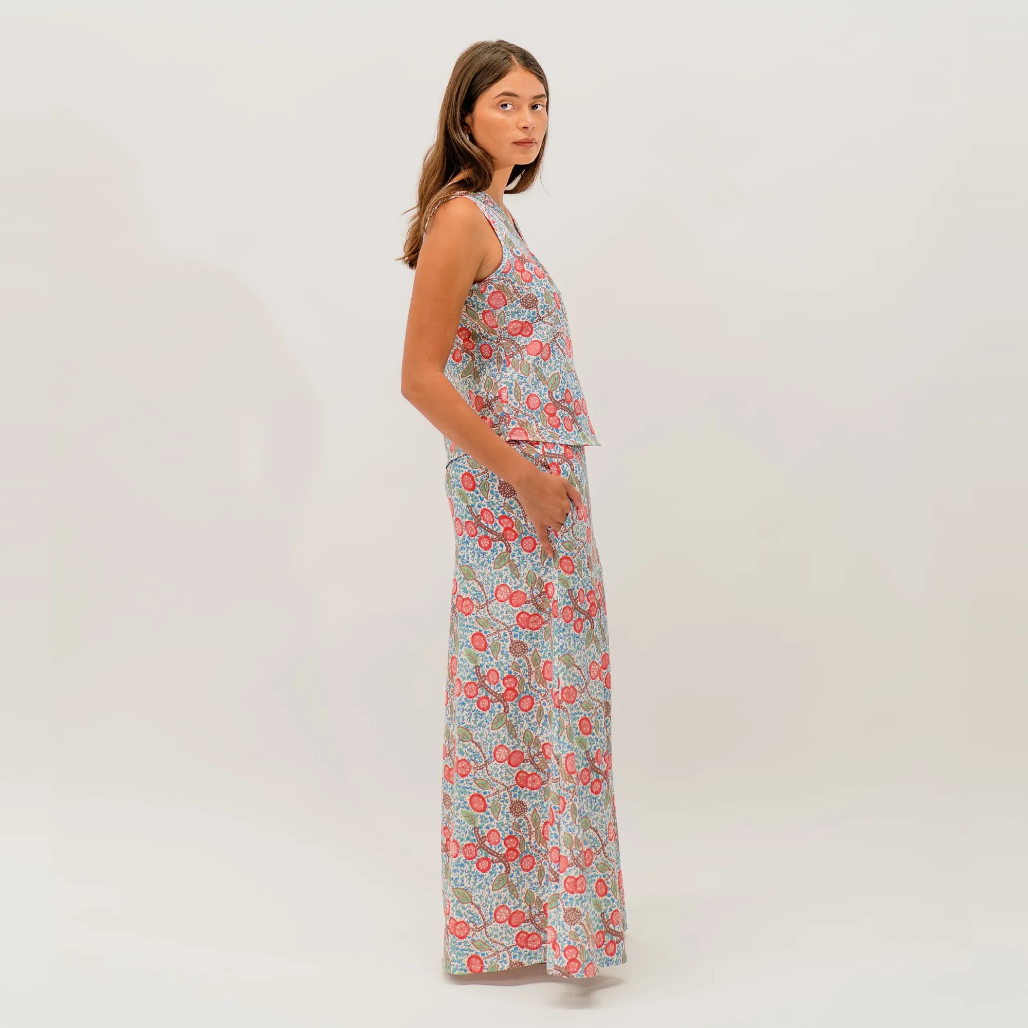 Women's Bushtucker skirt showcasing colourful Indigenous artwork by Australian artist Sally White.