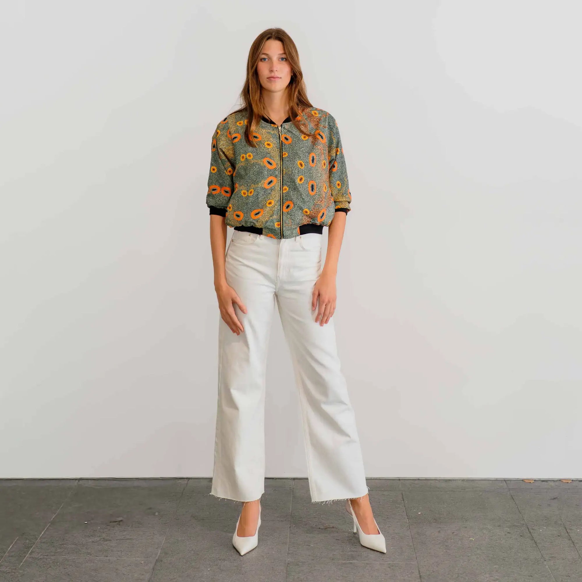 Stylish women's Dry Country 3/4 Sleeve Bomber Jacket featuring unique Aboriginal-inspired artwork.