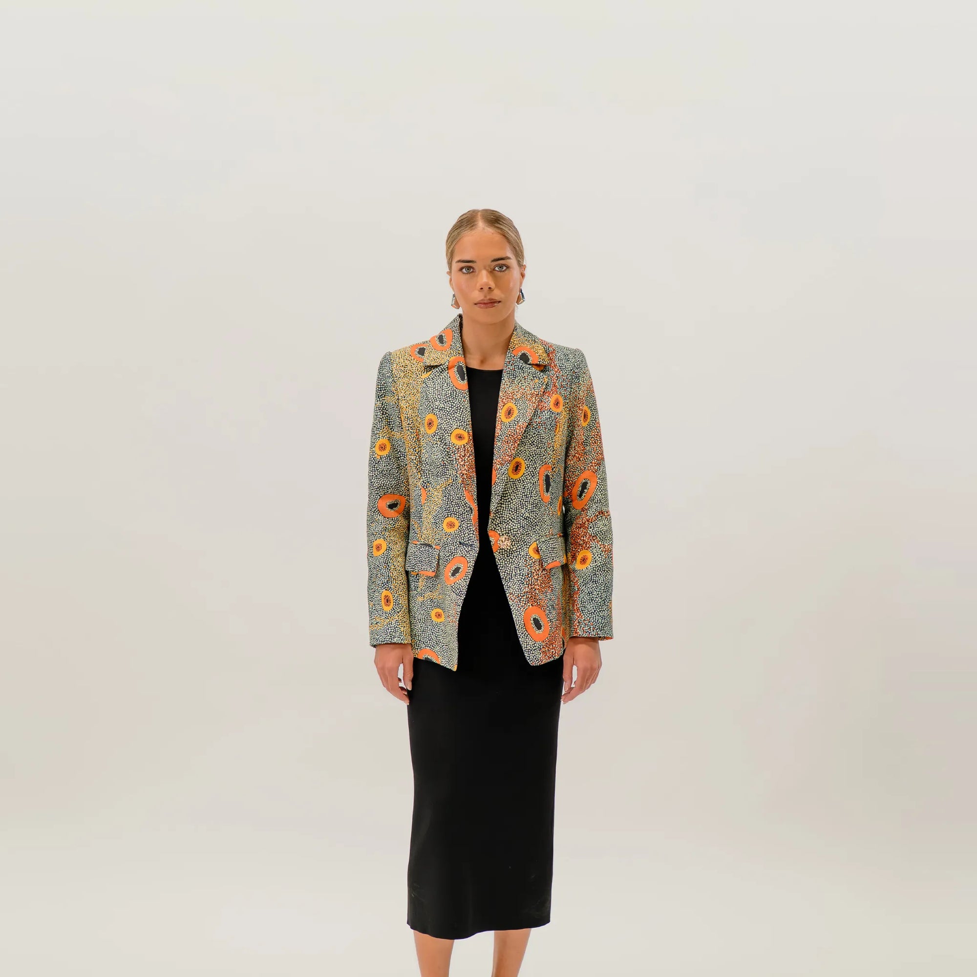 Front view of Kirrikin Dry Country Jacket featuring bold Australian bush artwork by Sheryl Hicks