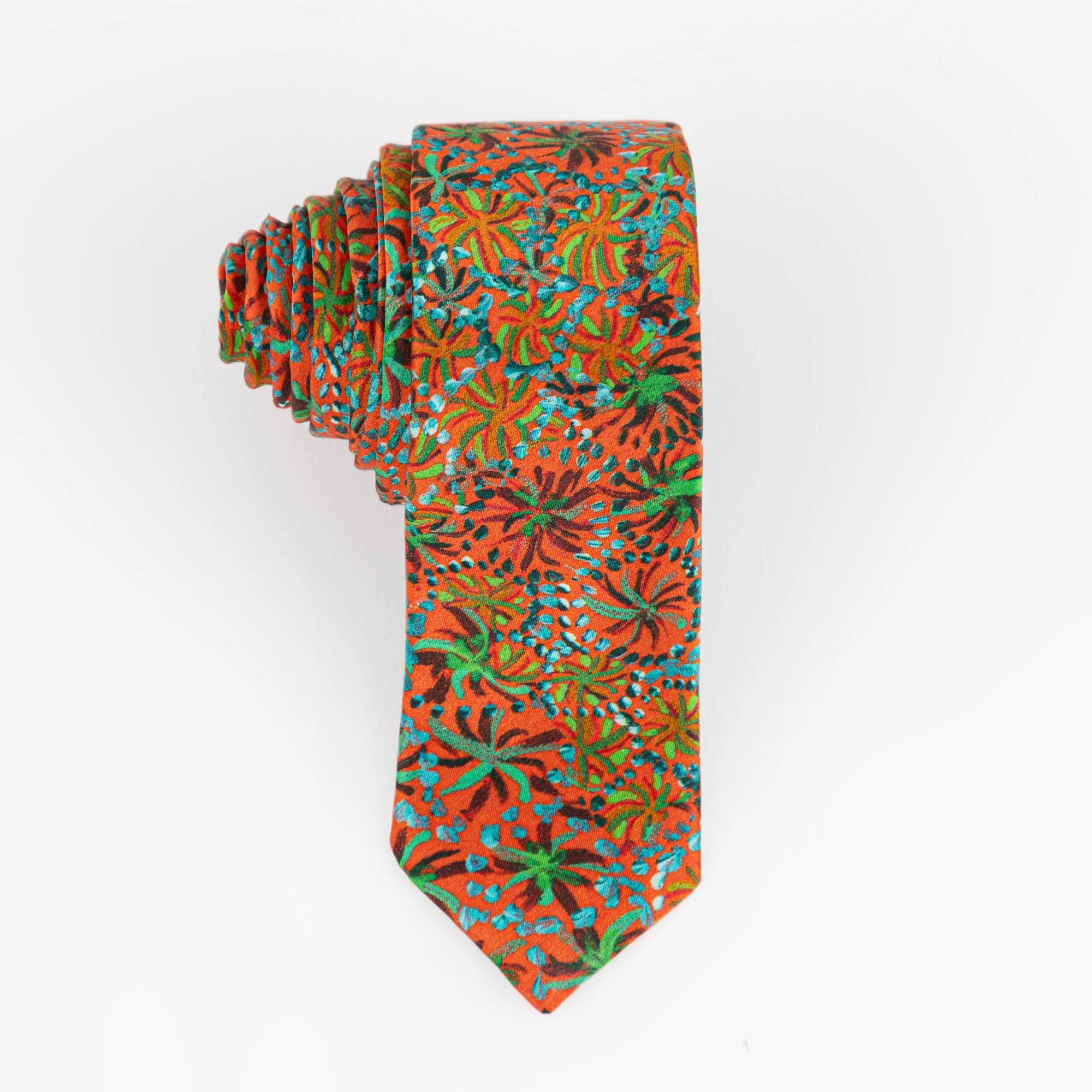 Kirrikin Exmouth 100% silk necktie styled as a formal luxury accessory featuring authentic Australian Aboriginal design.