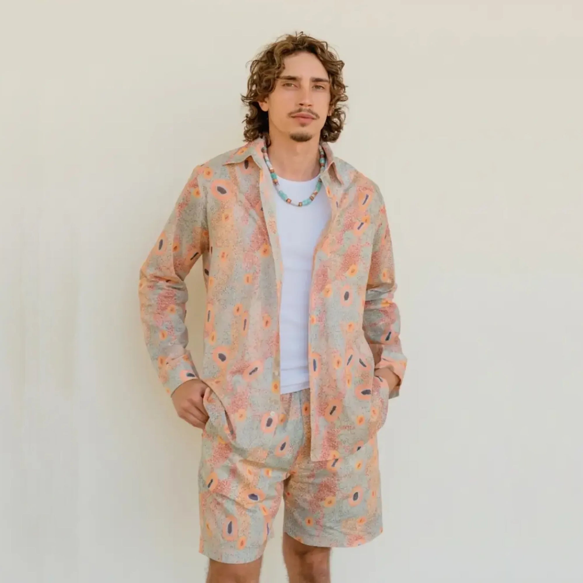 Breathable men's long sleeve resort shirt featuring original Aboriginal artwork, designed by Kirrikin.
