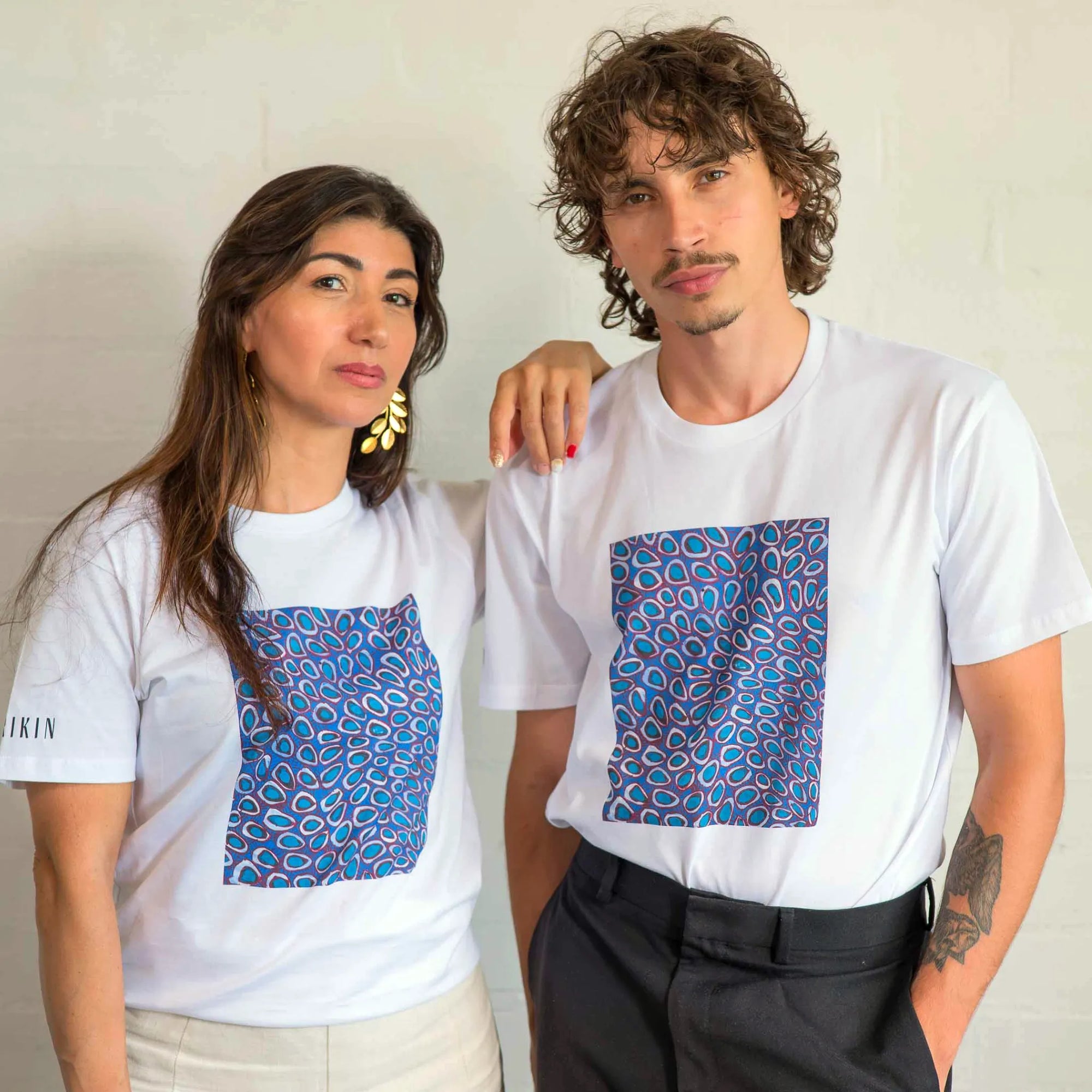 Front view of the Pilbara Wildflowers T-shirt in organic cotton featuring a vintage botanical illustration of Western Australian flora.