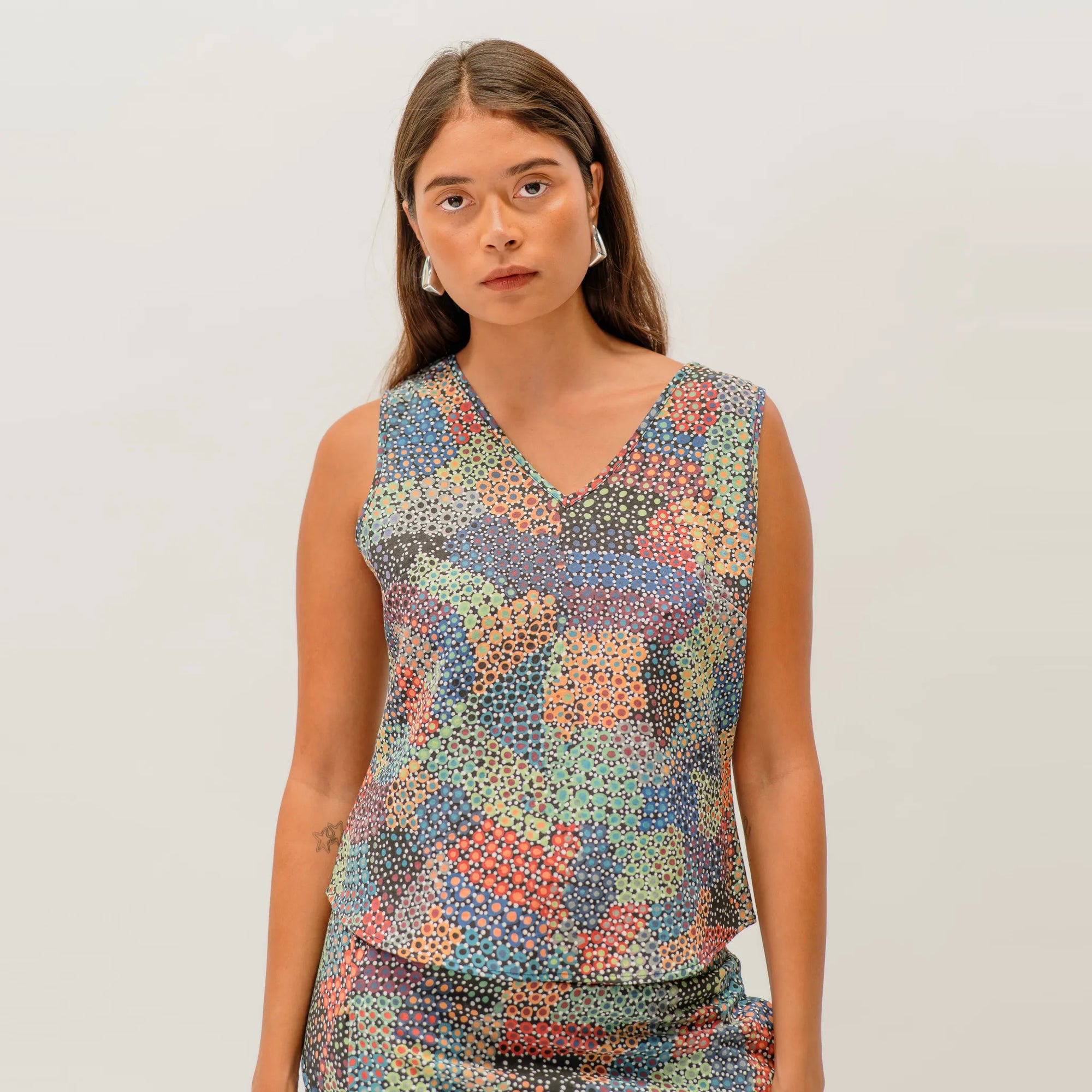 Pilbara Wildflowers Tank Top featuring vibrant Australian native wildflower artwork by Sheryl Hicks, inspired by the Pilbara region.