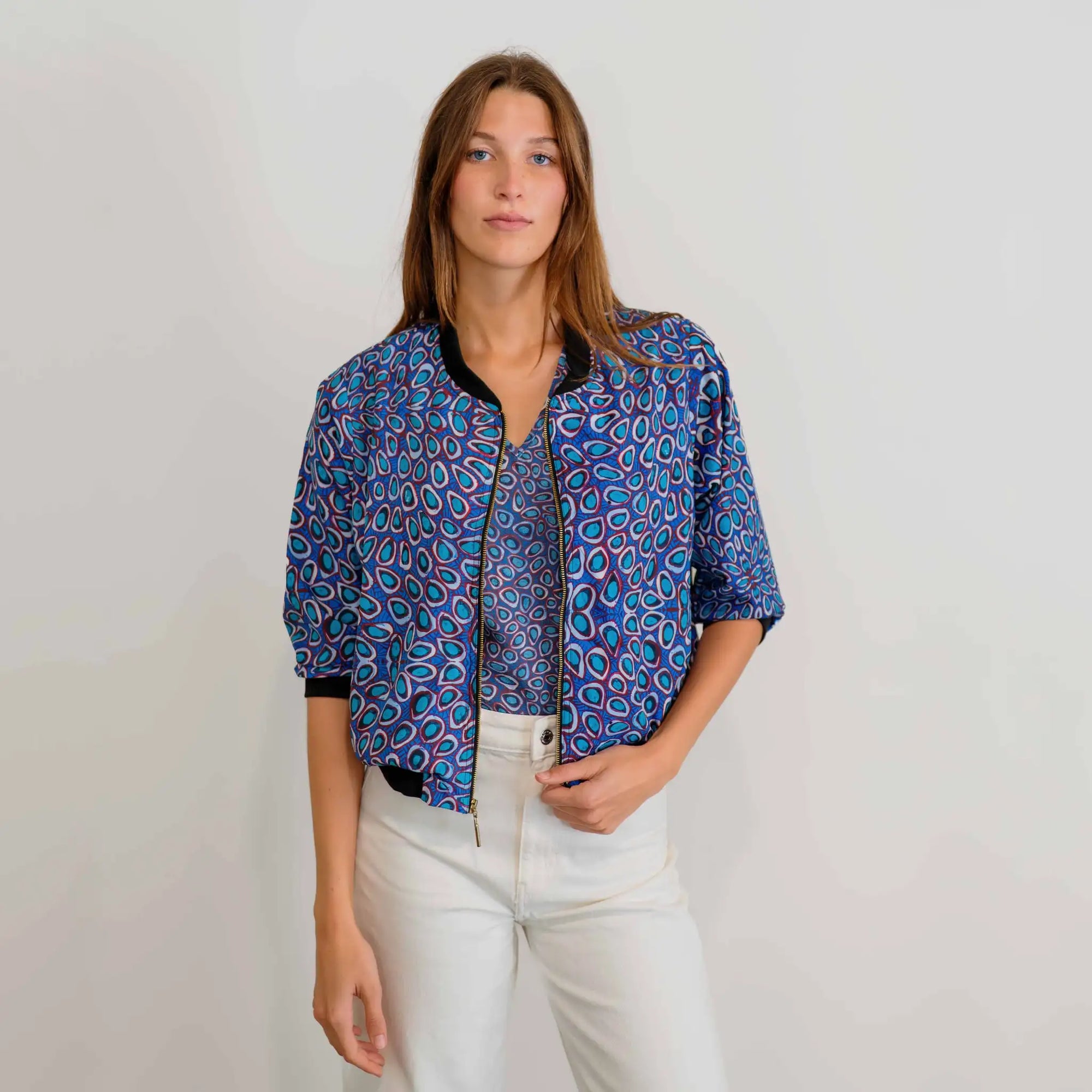 Pilbara Wildflowers Bomber Jacket featuring vibrant native Australian wildflower artwork inspired by the Pilbara region.