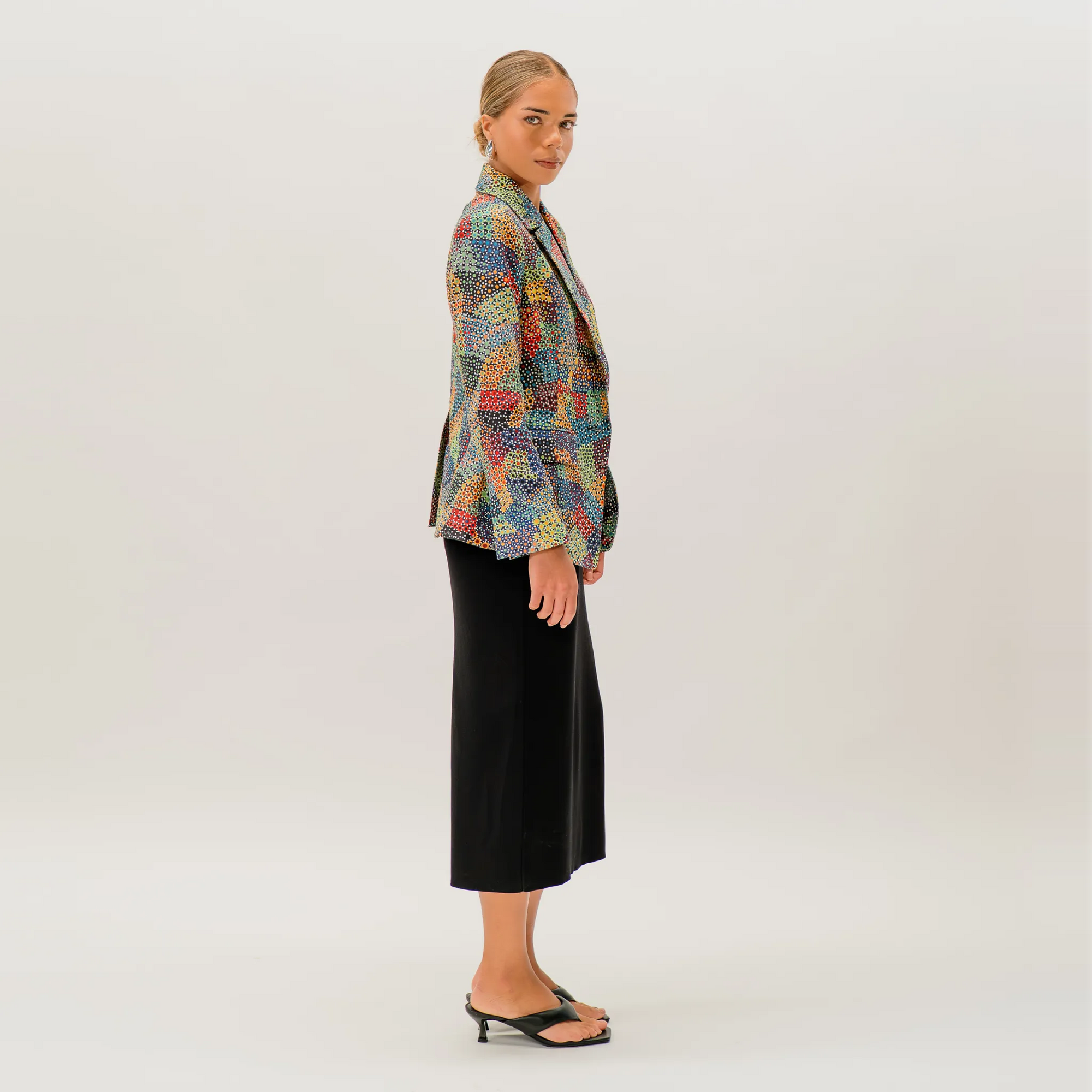The Pilbara Wildflowers artwork by Sheryl Hicks printed on the Kirrikin jacket.