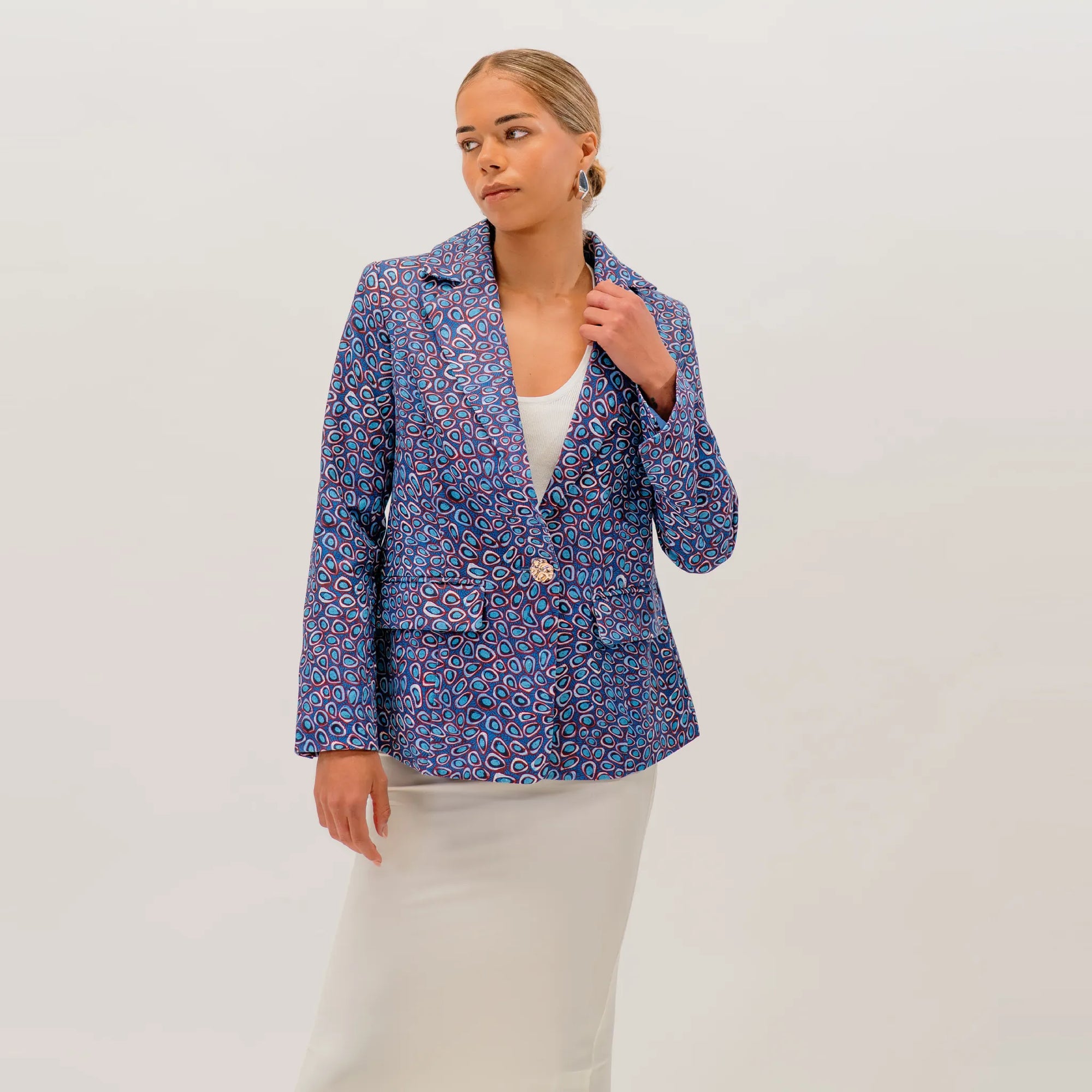 Wildflowers in the Pilbara Jacket featuring vibrant Australian native wildflower artwork by Carol Martin inspired by the Pilbara region.