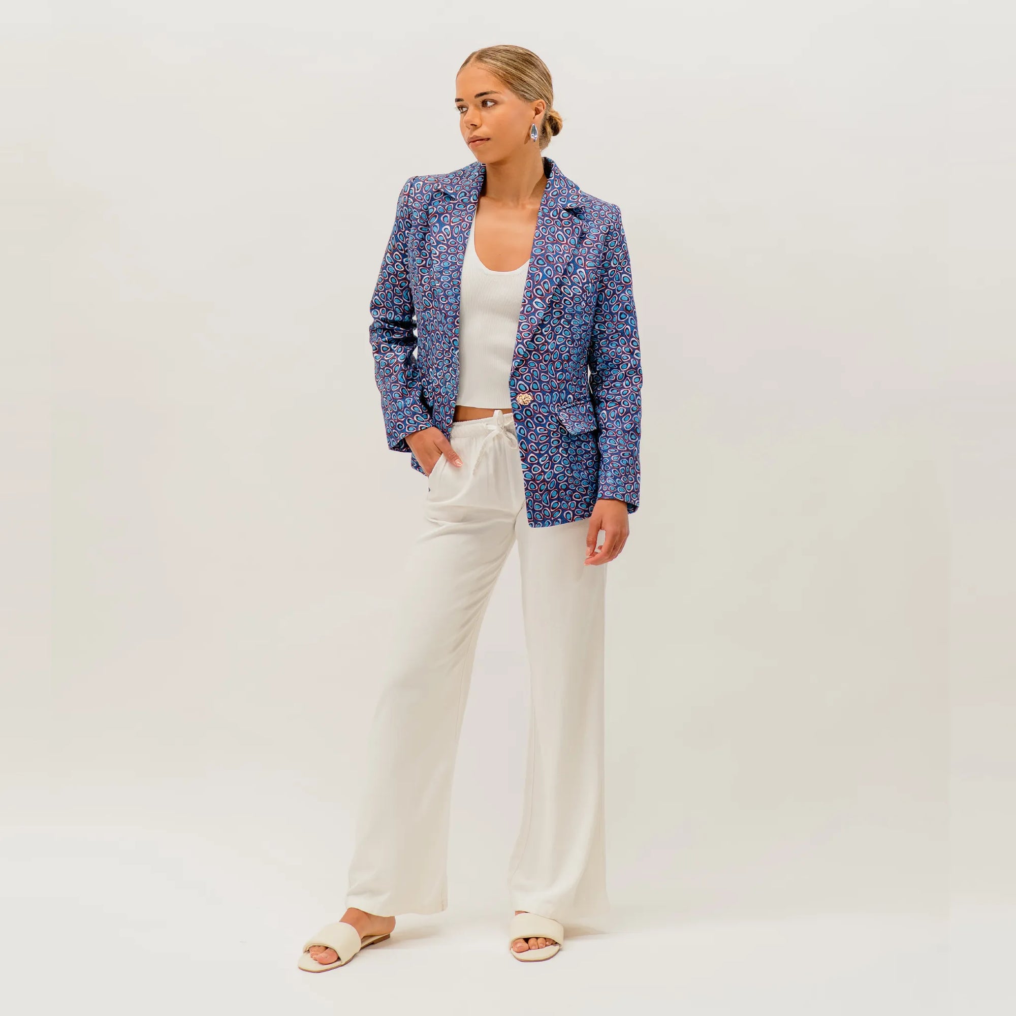 Stylish Wildflowers in the Pilbara Jacket featuring contemporary Indigenous artwork by Australian artist Carol Martin.